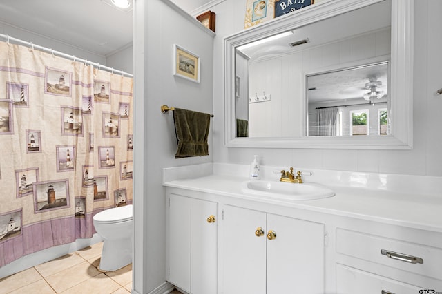 1901 Livingston St, Longview, TX 75601 - bathroom featuring toilet, vanity, tile patterned floors, and curtained shower