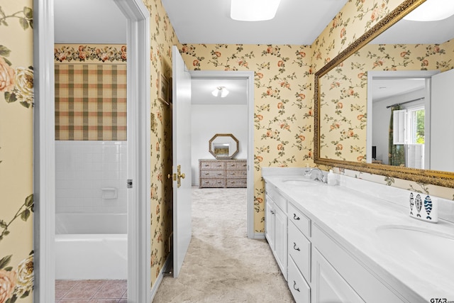 1901 Livingston St, Longview, TX 75601 - bathroom featuring wallpapered walls, double vanity, and baseboards