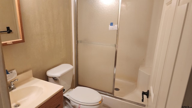 20501 Jak Ln, Chandler, TX 75758 - bathroom with a shower stall, toilet, vanity, and a textured wall