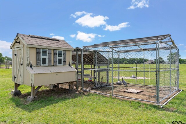 5044 Hidden Ct, Quinlan, TX 75474 - view of yard featuring exterior structure and an outbuilding