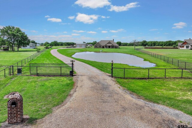 5044 Hidden Ct, Quinlan, TX 75474 - surrounding community with a yard and fence