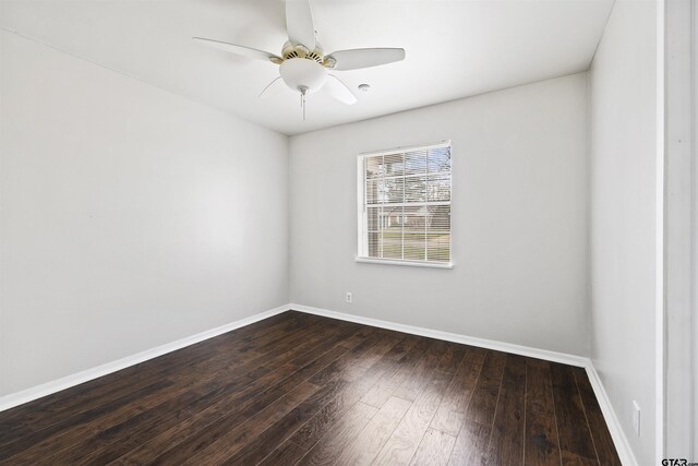 4001 Darrell Ln, Tyler, TX 75701 - empty room featuring baseboards, dark wood finished floors, and a ceiling fan
