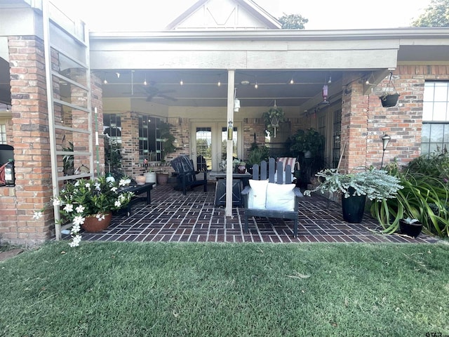 view of patio featuring an outdoor living space and ceiling fan