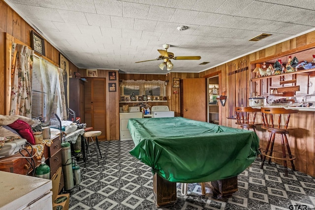 500 W Mclean St, Talco, TX 75487 - recreation room with tile patterned floors, wooden walls, washing machine and dryer, billiards, and a ceiling fan