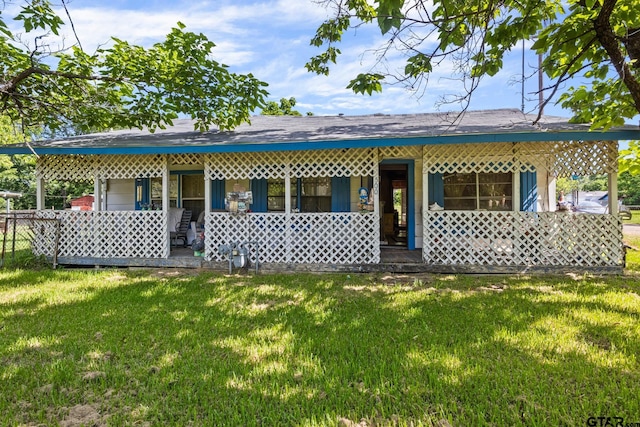 500 W Mclean St, Talco, TX 75487 - back of house featuring a porch and a lawn
