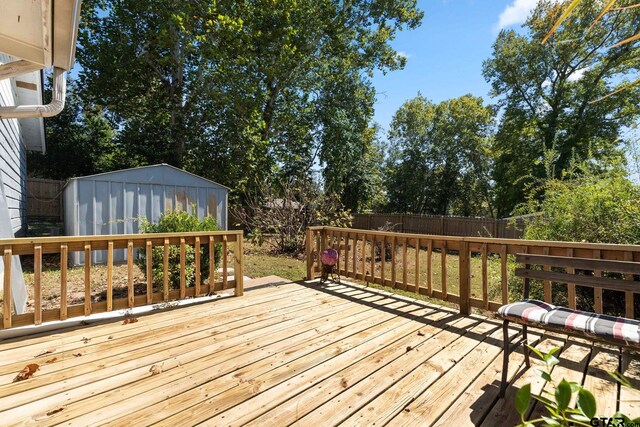 deck featuring a storage shed