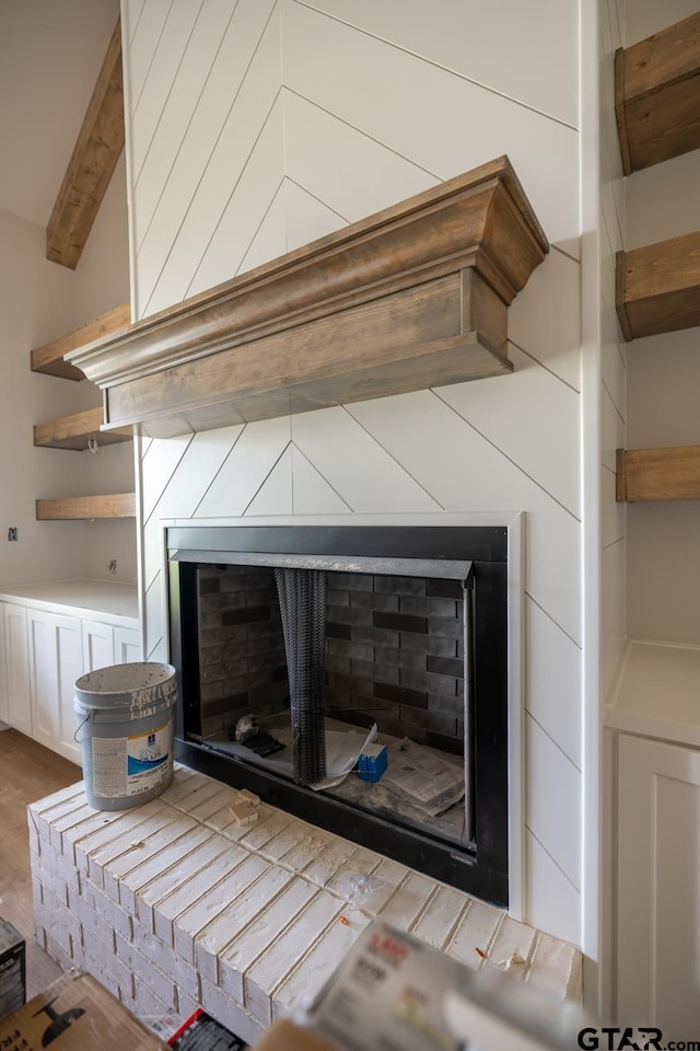 529 Eland Way, Bullard, TX 75757 - detailed view of a fireplace with raised hearth and wood finished floors