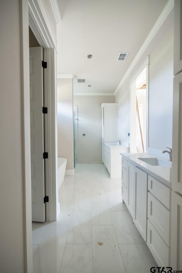 529 Eland Way, Bullard, TX 75757 - full bath with vanity, crown molding, marble look tile flooring, and a freestanding tub