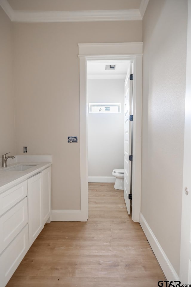 529 Eland Way, Bullard, TX 75757 - bathroom featuring ornamental molding, wood finished floors, and vanity