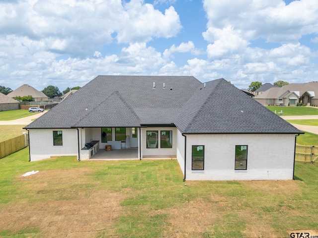 529 Eland Way, Bullard, TX 75757 - rear view of property featuring brick siding, a fenced backyard, a patio, a shingled roof, and a residential view