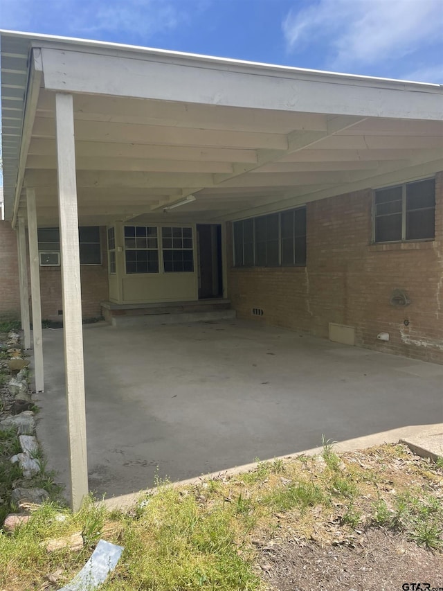 2800 Tanglewood, Tyler, TX 75703 - view of parking featuring a carport