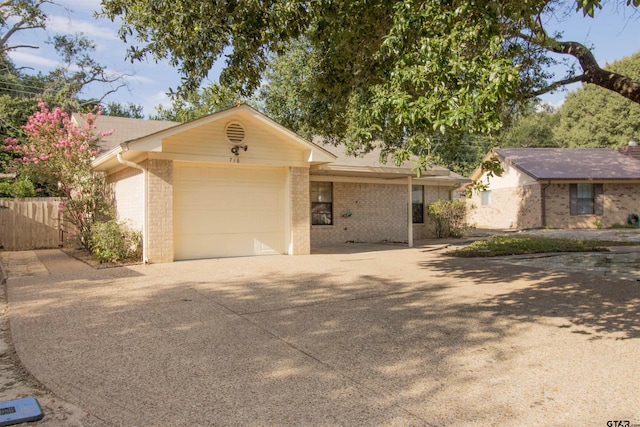 single story home with a garage