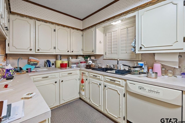 kitchen featuring dishwasher, sink, a textured ceiling, and crown molding