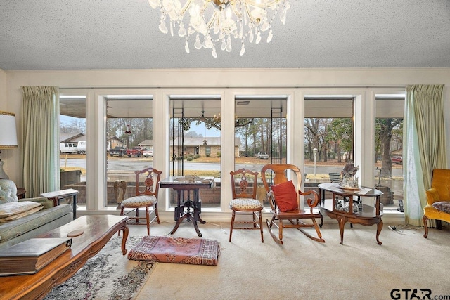 interior space with plenty of natural light and carpet flooring