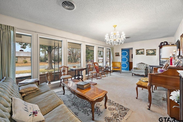 living room with carpet flooring, a textured ceiling, and an inviting chandelier