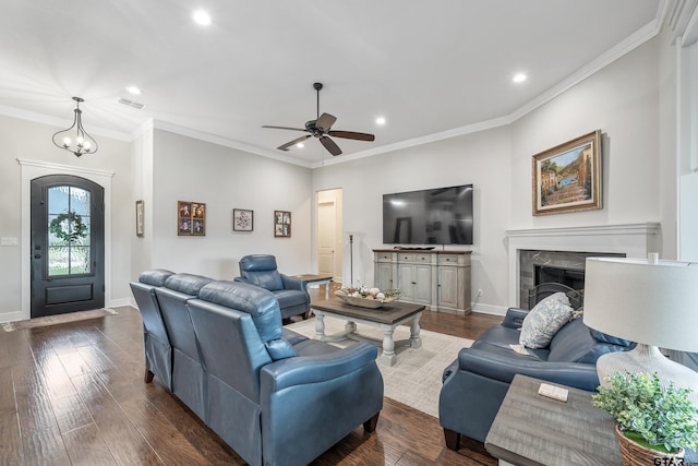 7306 Tule Creek Ln, Tyler, TX 75703 - living room with recessed lighting, a fireplace, ceiling fan, dark wood finished floors, and crown molding