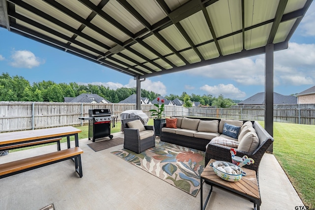 7306 Tule Creek Ln, Tyler, TX 75703 - fenced backyard featuring an outdoor hangout area, a grill, and a patio