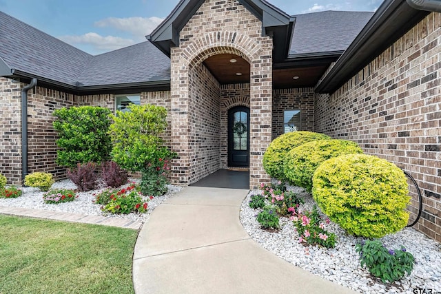7306 Tule Creek Ln, Tyler, TX 75703 - property entrance with brick siding and a shingled roof