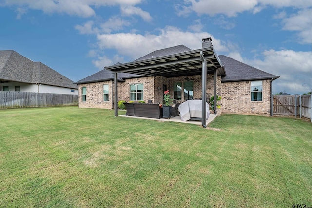 7306 Tule Creek Ln, Tyler, TX 75703 - back of property with a fenced backyard, an outdoor hangout area, brick siding, a patio area, and a ceiling fan