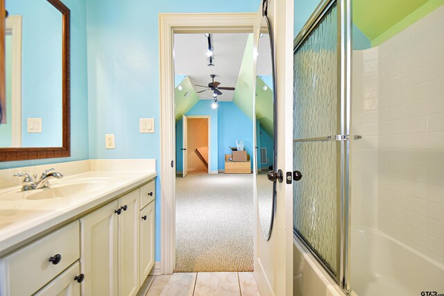 1860 Holcomb Cir, Tyler, TX 75703 - bathroom with vanity, vaulted ceiling, and shower / bath combination with glass door