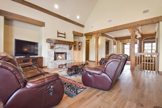 1860 Holcomb Cir, Tyler, TX 75703 - living room with visible vents, wood finished floors, and a fireplace