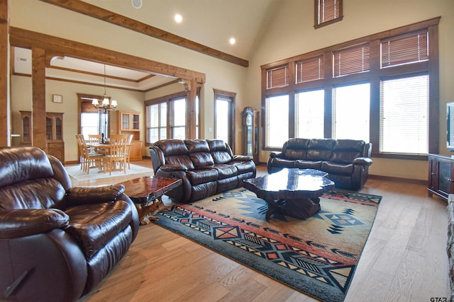1860 Holcomb Cir, Tyler, TX 75703 - living room with a wealth of natural light, high vaulted ceiling, and wood finished floors
