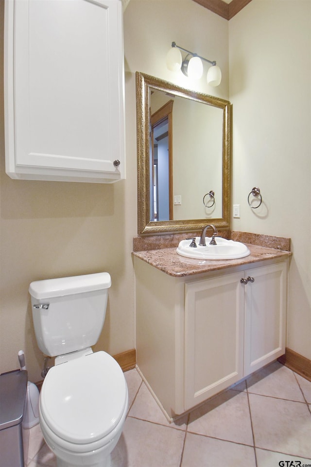 1860 Holcomb Cir, Tyler, TX 75703 - half bathroom featuring tile patterned floors, toilet, vanity, and baseboards