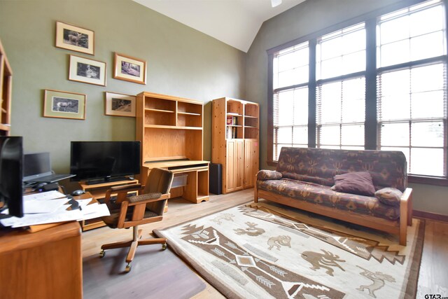 1860 Holcomb Cir, Tyler, TX 75703 - office area with baseboards, vaulted ceiling, and light wood finished floors