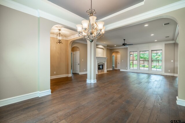 936 Cambridge Bnd, Tyler, TX 75703 - unfurnished living room with arched walkways, ceiling fan, recessed lighting, a chandelier, and crown molding
