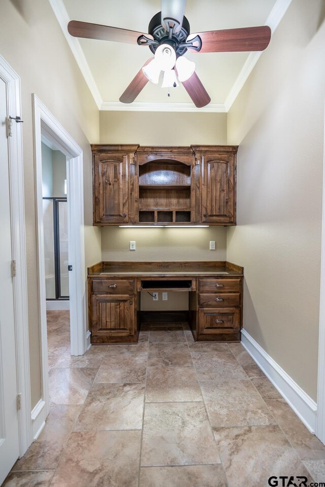 936 Cambridge Bnd, Tyler, TX 75703 - unfurnished office featuring ornamental molding, built in desk, a ceiling fan, and baseboards