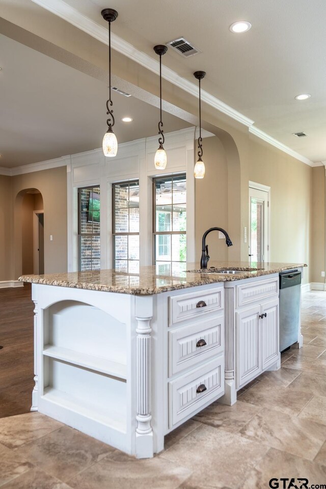 936 Cambridge Bnd, Tyler, TX 75703 - kitchen with a sink, arched walkways, dishwasher, crown molding, and white cabinetry