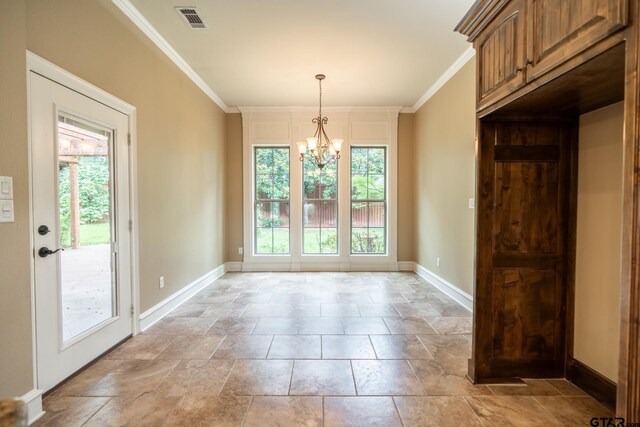 936 Cambridge Bnd, Tyler, TX 75703 - unfurnished dining area featuring stone tile flooring, a chandelier, baseboards, and ornamental molding