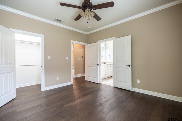 936 Cambridge Bnd, Tyler, TX 75703 - unfurnished bedroom with ornamental molding, dark wood finished floors, baseboards, connected bathroom, and ceiling fan
