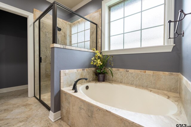 936 Cambridge Bnd, Tyler, TX 75703 - full bath with a stall shower and a bath
