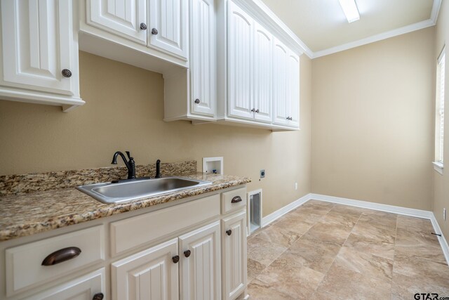 936 Cambridge Bnd, Tyler, TX 75703 - laundry area featuring electric dryer hookup, ornamental molding, cabinet space, hookup for a washing machine, and baseboards