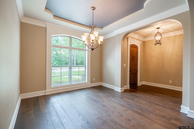 936 Cambridge Bnd, Tyler, TX 75703 - spare room featuring arched walkways, a chandelier, dark wood-style flooring, baseboards, and a tray ceiling