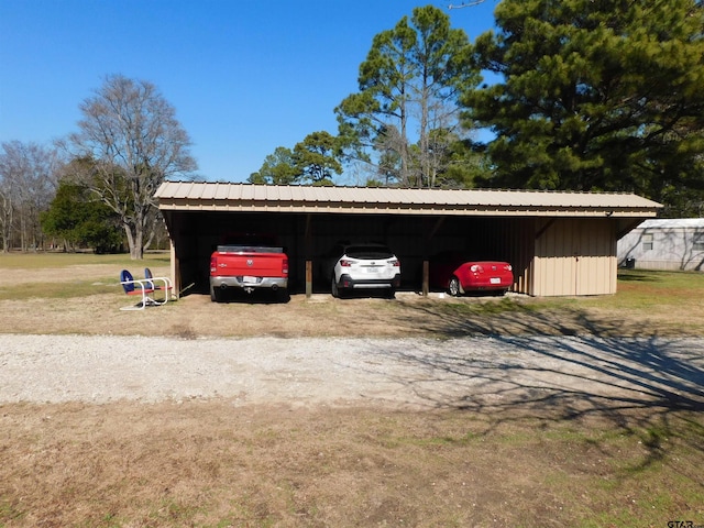 exterior space with a carport