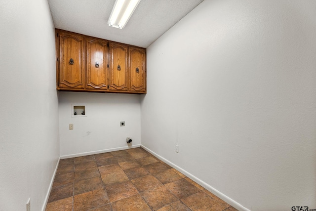 laundry room featuring cabinets, hookup for an electric dryer, and hookup for a washing machine