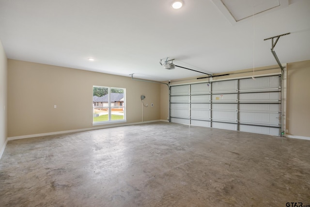 14524 Woodland Creek Dr, Tyler, TX 75706 - garage with a garage door opener, baseboards, and recessed lighting