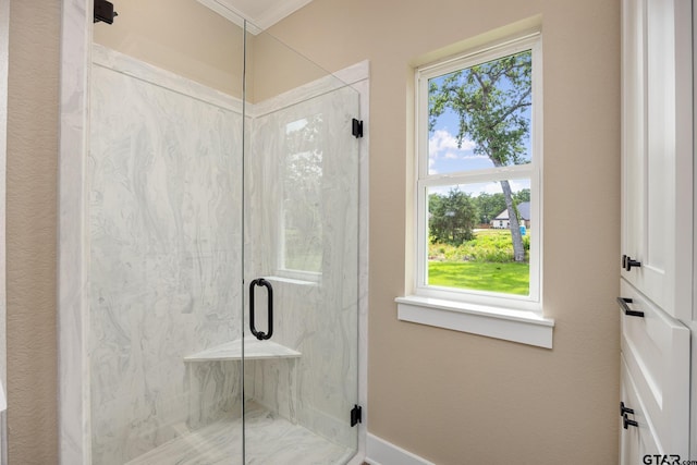 14524 Woodland Creek Dr, Tyler, TX 75706 - full bathroom featuring a marble finish shower, plenty of natural light, and ornamental molding