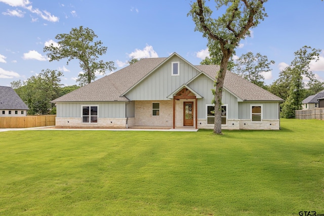 14524 Woodland Creek Dr, Tyler, TX 75706 - modern farmhouse featuring a shingled roof, board and batten siding, and a patio