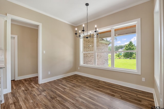 14524 Woodland Creek Dr, Tyler, TX 75706 - unfurnished dining area featuring a chandelier, dark wood-style floors, baseboards, and ornamental molding