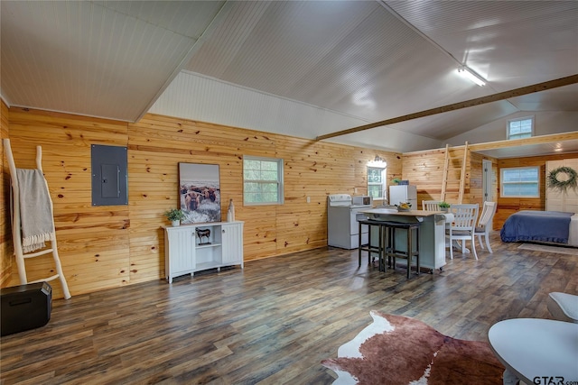 313 County Road 1442, Sulphur Springs, TX 75482 - kitchen with electric panel, wood walls, wood finished floors, plenty of natural light, and vaulted ceiling