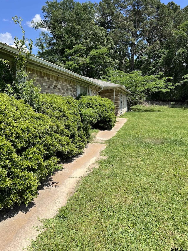 view of yard with fence