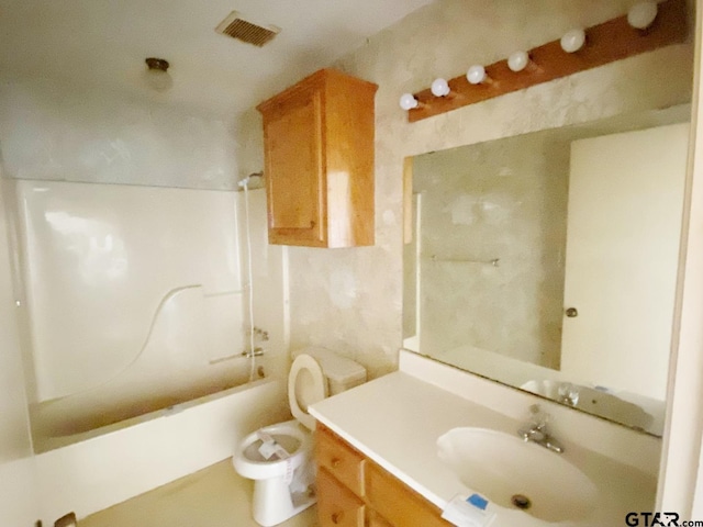 full bath featuring visible vents, shower / bathing tub combination, vanity, and toilet