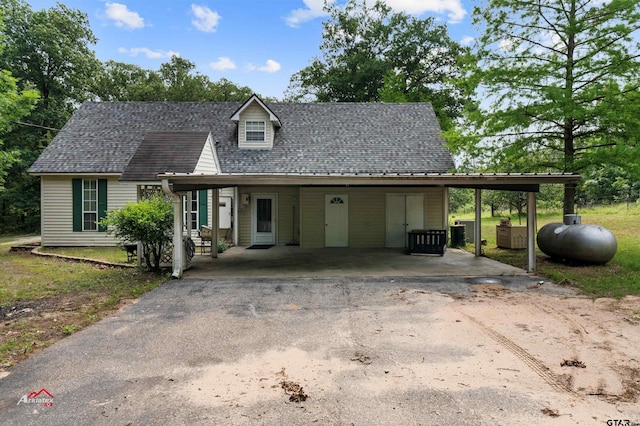 view of front of home with a carport