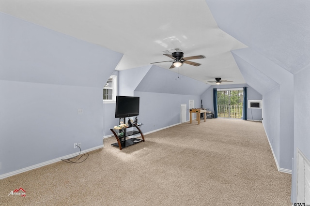 bonus room featuring carpet, lofted ceiling, and ceiling fan