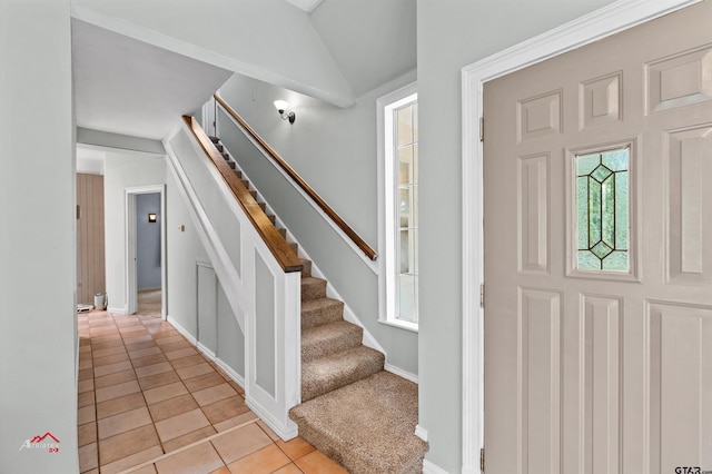 entryway featuring light tile patterned floors