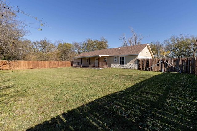 view of yard featuring a deck