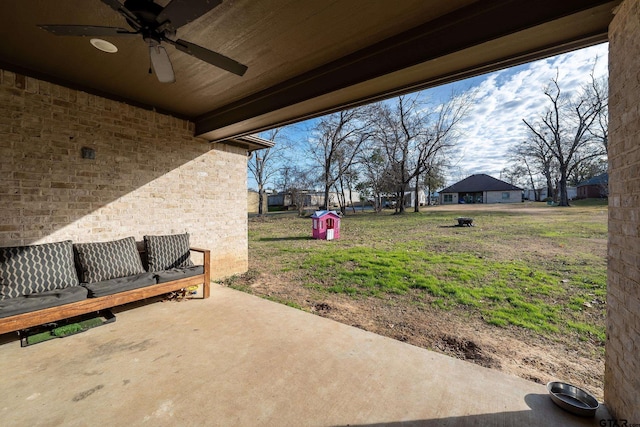 view of patio with ceiling fan